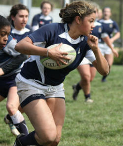 Women playing rugby